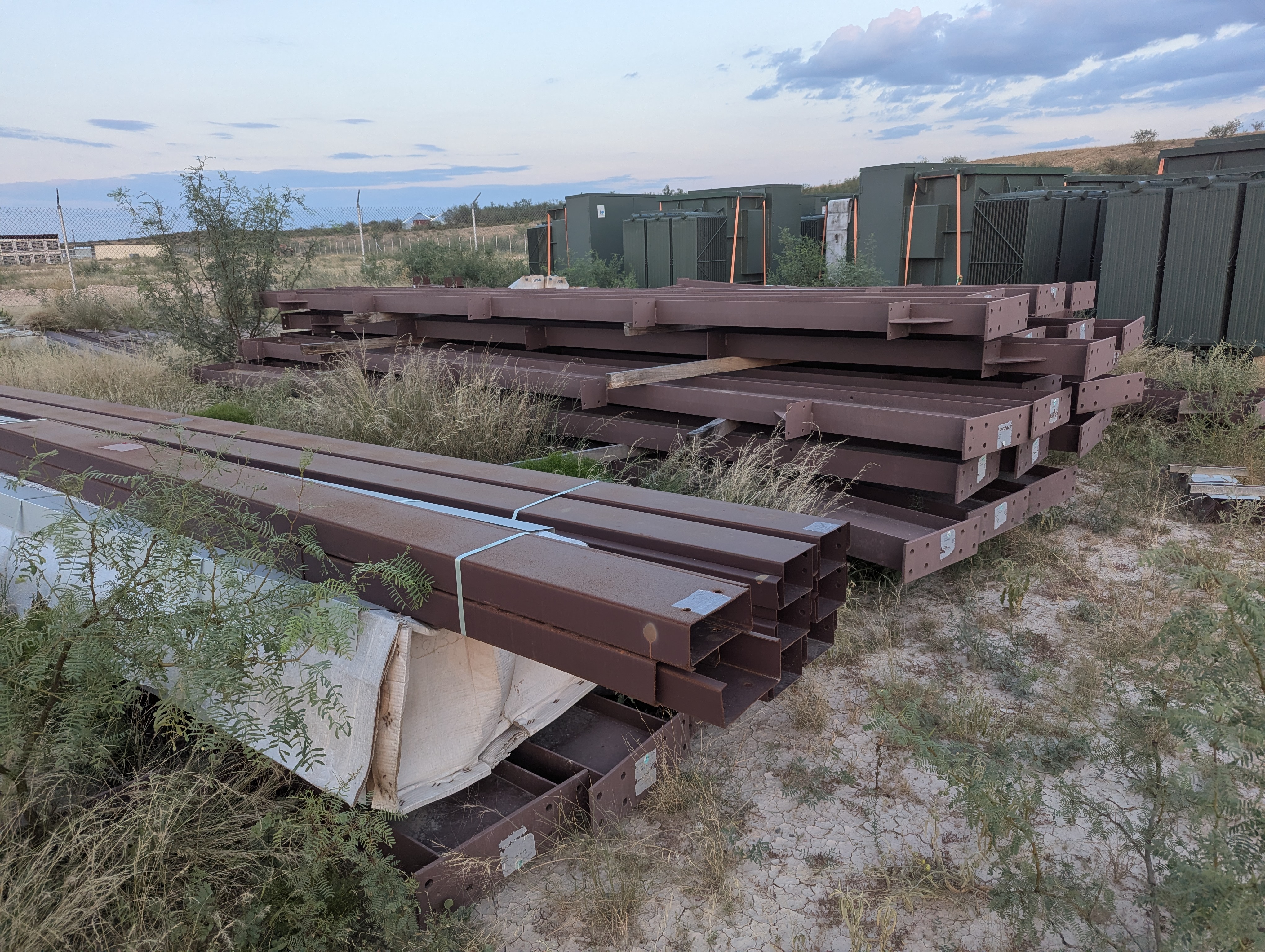 Heavy steel members staged for infrastructure construction