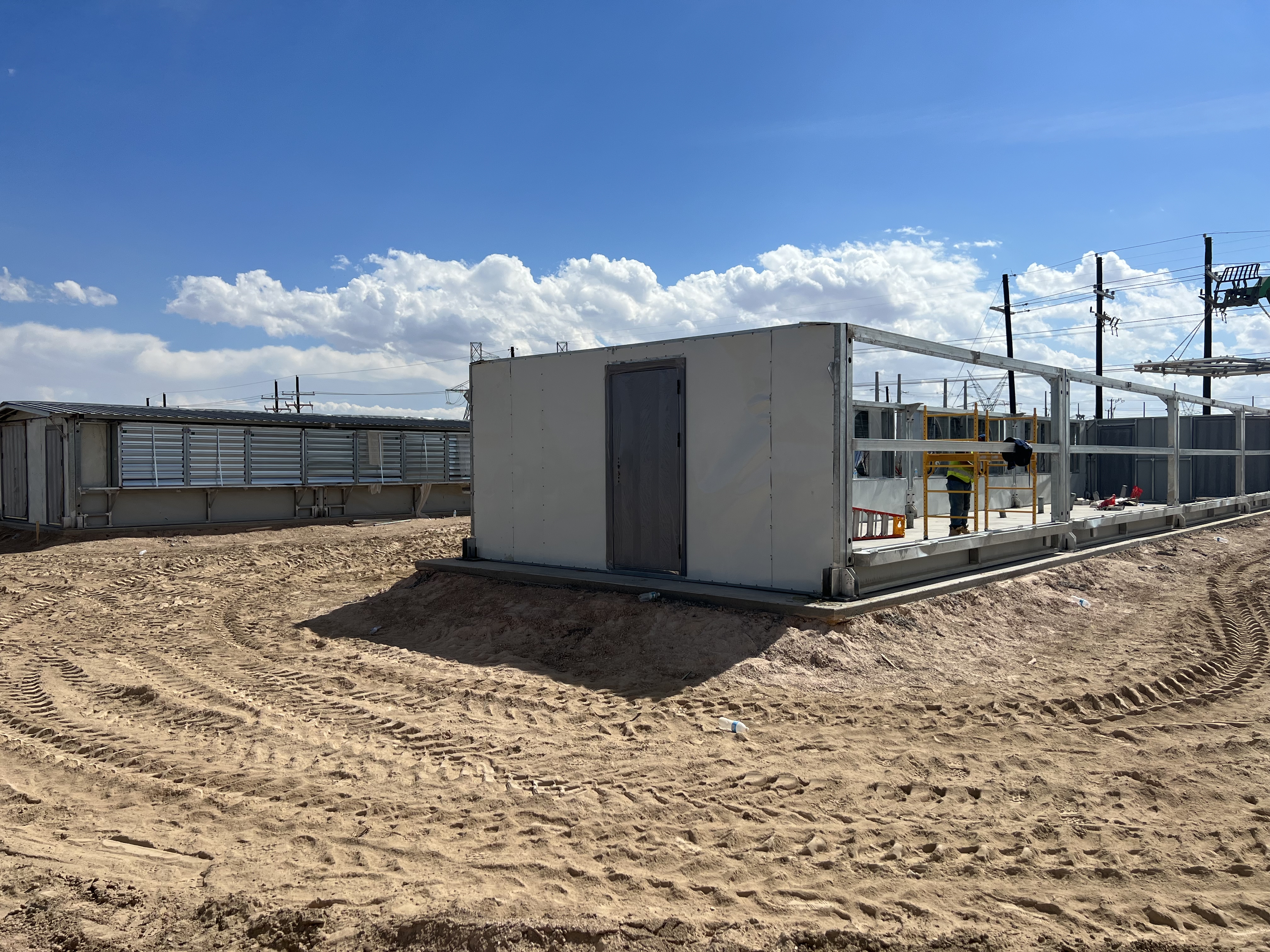 Modular unit assembly demonstrating field deployment workflow